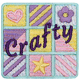 The word Crafty over a quilt-themed badge.