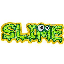 This badge spells out the word Slime. Each letter is covered in dripping green goop, and the M has two monster eyes on it.