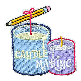 Two jars with candles inside them and a pencil holding the wick.