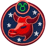 This circular crest has the side profile of a bull surrounded by stars. The sign of Taurus sits above his head.
