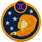 This circular crest has the side profile of two girls surrounded by stars. The sign of Gemini sits above his head.