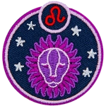 This circular crest has an image of a lion surrounded by stars. The sign of Leo sits above his head.