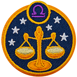 This circular crest displays the scales of justice surrounded by stars. The sign of Libra sits above it.