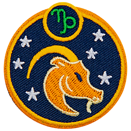 This circular crest has the side profile of a goat surrounded by stars. The sign of Capricorn sits above his head.