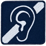 An ear on a blue background with a crossed-out speaker.