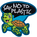 A turtle happily swims as it says Say No To Plastic in a speech bubble above his head.