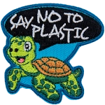A turtle happily swims as it says Say No To Plastic in a speech bubble above his head.