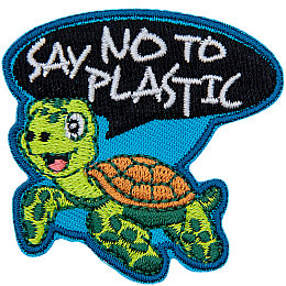 A turtle happily swims as it says Say No To Plastic in a speech bubble above his head.