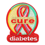 The words Cure Diabetes are on and around a multicoloured ribbon.