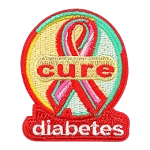 The words Cure Diabetes are on and around a multicoloured ribbon.