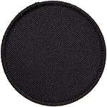 A blank, circular black badge.