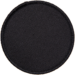 A blank, circular black badge.