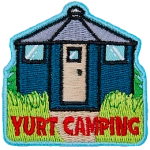 A yurt nestled between foliage with the words Yurt Camping below it.
