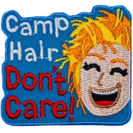 Camp Hair Don't Care is next to someone with messy blonde hair.