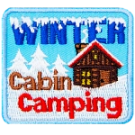 The words Winter Cabin Camping surround a red-roofed cabin in a snowy landscape. 