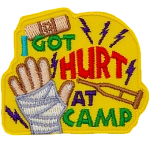The words I Got Hurt At Camp are next to a bandaged hand.
