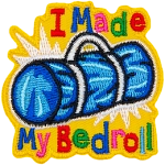 The words I Made My Bedroll from a blue bedroll bag.