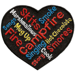 A wordle in the shape of a heart. It has campfire-related words, such as smoke, songs and cook.