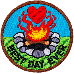 A campfire with a heart above it. The words Best Day Ever are in an arc across the bottom.