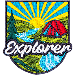 A round red tent sits in front of a setting sun. The word Explorer is in the foreground.