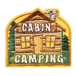 A rustic wood cabin in the woods with the words Cabin Camping on it.