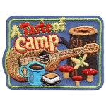 A stump, mushrooms, guitar and s'mores under the words A Taste Of Camp.