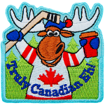 An anthropomorphic moose in a maple leaf jersey holds a hockey stick and coffee cup. The words Truly Canadian Eh! are across the bottom.