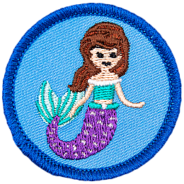 A mermaid with brown hair and a purple tail is on a blue circle.