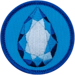 A sapphire on a blue background.