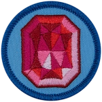 A red ruby on a blue background.