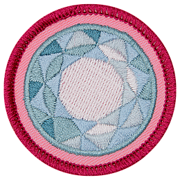 The top of a diamond is on a blue background.