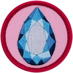 A sapphire surrounded by a ring of yellow on a pink background.