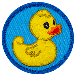 A yellow rubber duck stares vacantly off to the right of this round, merrow border patch.