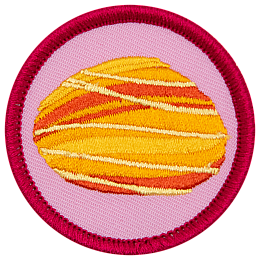 A fire opal is in the centre of a circular pink badge.