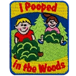 The words I Pooped In The Woods are above and below two figures in bushes.