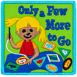 A young girl sews patches onto her sash. The words Only A Few More To Go are next to her.
