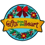 A holiday wreath has a yellow ribbon over it that reads Gifts From The Heart.