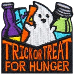 The words Trick Or Treat For Hunger are on a box with a ghost and non-perishable inside.