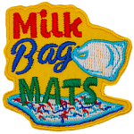 The words Milk Bag Mats are above a mat woven from milk bags. A milk bag is attached to the word Bag.