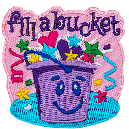 A smiling purple bucket is overflowing with hearts, stars, and confetti. The words Fill A Bucket is embroidered at the top of the patch.