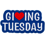 The words Giving Tuesday are sewn in white thread. The V in Giving is a heart.