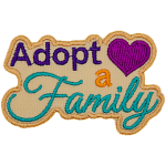 The words Adopt A Family on a cream background.