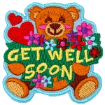 An adorable teddy bear holds a bouquet of flowers, and the words Get Well Soon.