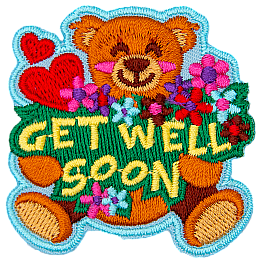 An adorable teddy bear holds a bouquet of flowers, and the words Get Well Soon.