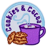 A cup of hot cocoa sits next to a stack of cookies under the words Cookies and Cocoa.
