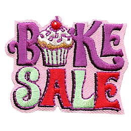 The words Bake Sale with a cupcake as the A.