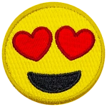 A yellow circle forms a smiley face with hearts for eyes and a big open-mouth smile.