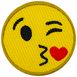 A yellow circle forms a smiley face with one eye closed in a wink, kissy lips, and a red heart.