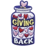 The words Giving Back on a jar of hearts.