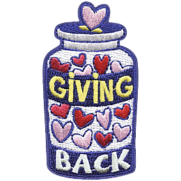 The words Giving Back on a jar of hearts.